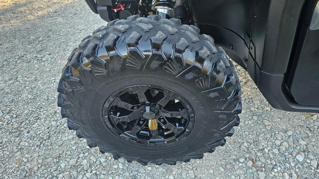 2023 Can-am Defender/traxter - $24,500