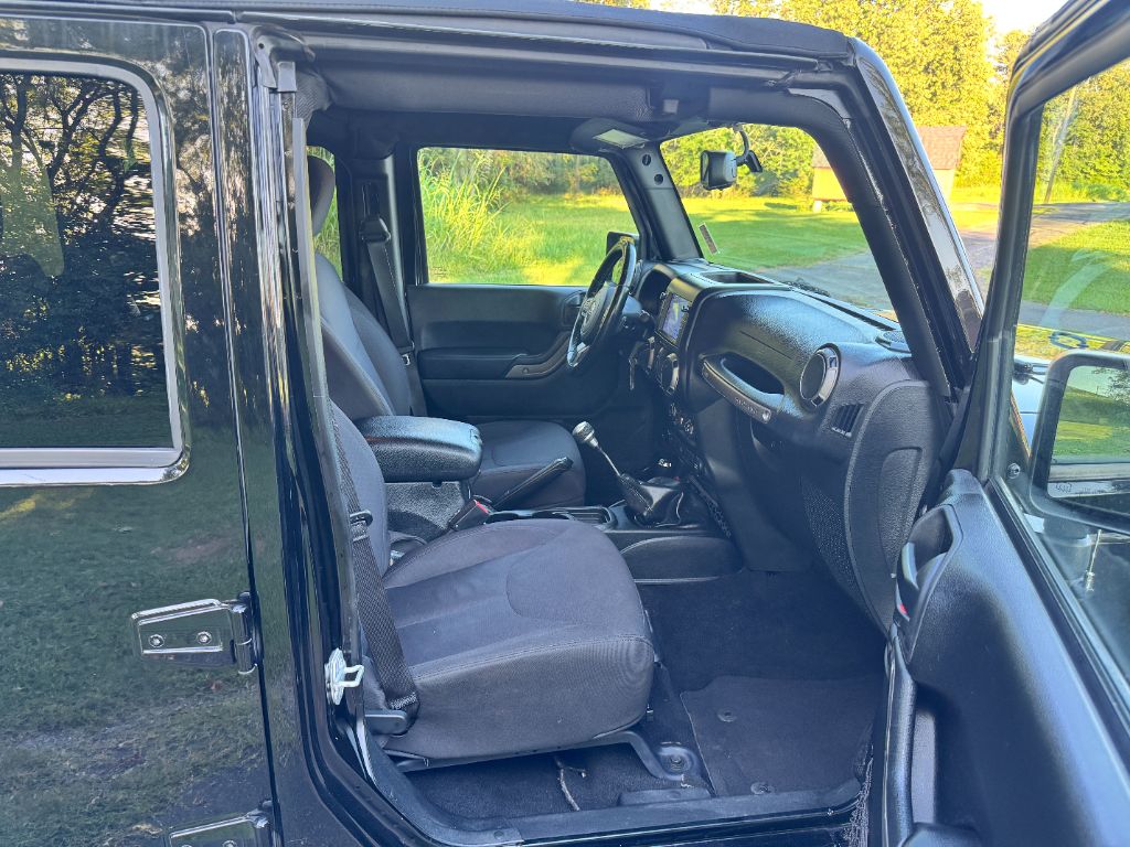 2015 Jeep Wrangler - $9,995