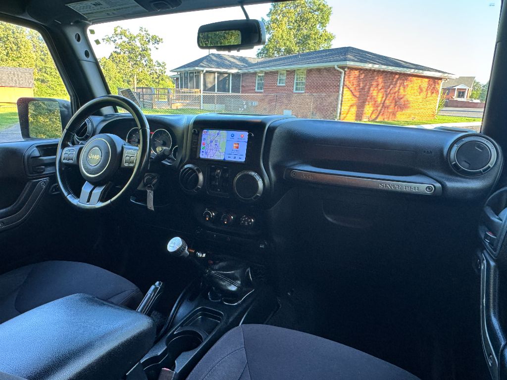 2015 Jeep Wrangler - $9,995