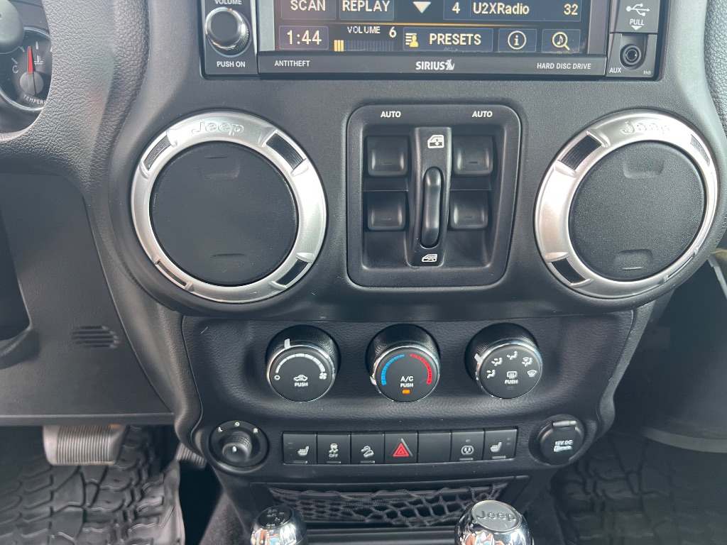 2015 Jeep Wrangler - $24,942