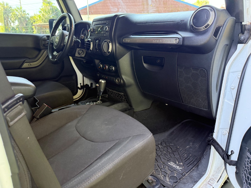2015 Jeep Wrangler - $11,555
