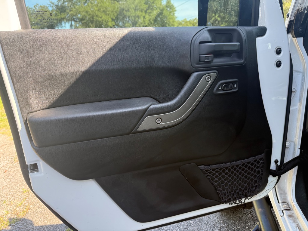 2015 Jeep Wrangler - $11,555