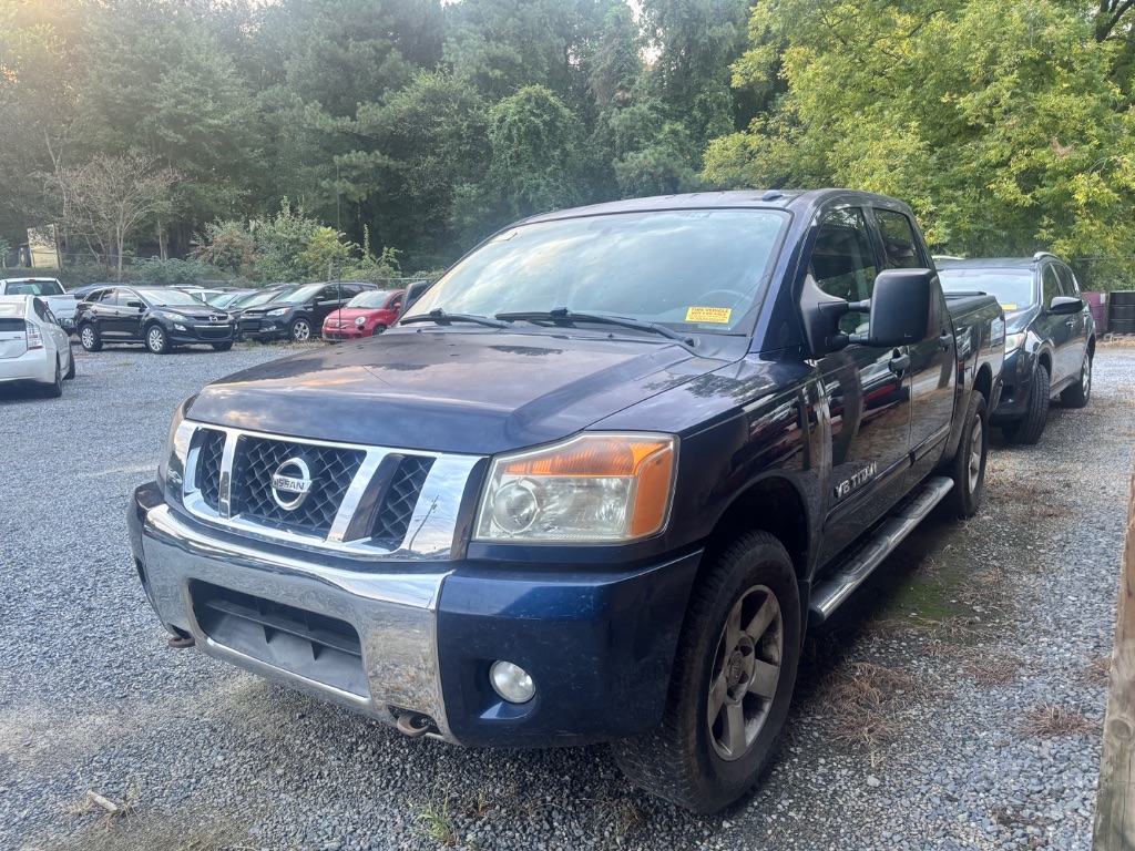 Blue 2010 Nissan Titan LE Crew Cab Pickup Truck 4X2 Automatic