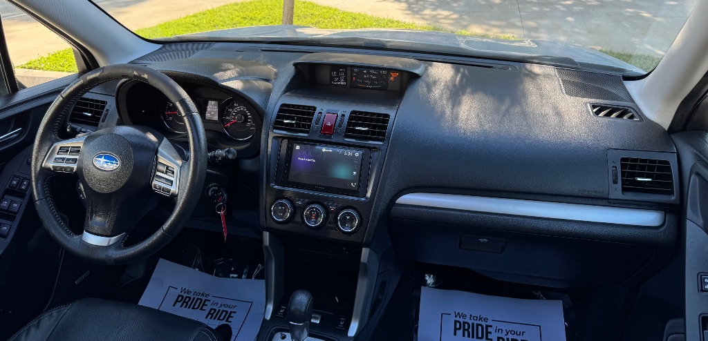 2014 Subaru Forester - $9,395