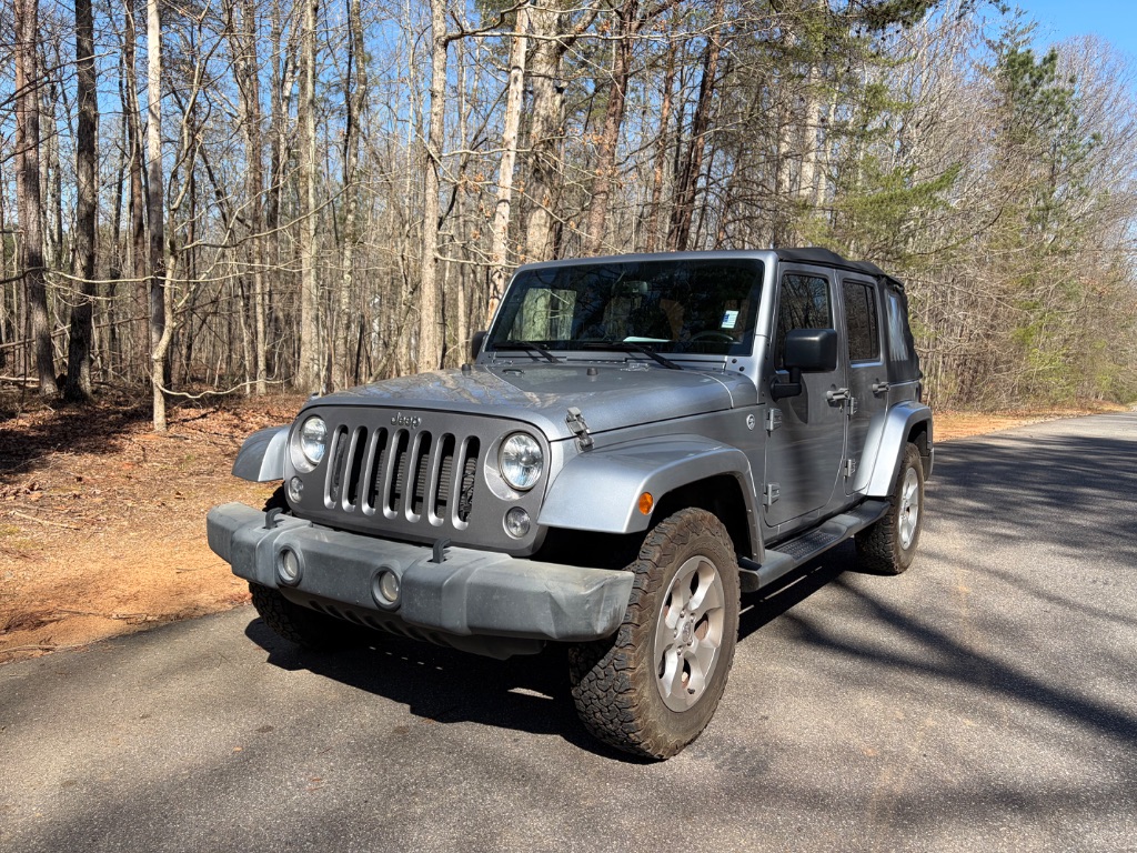 Silver 2015 Jeep Wrangler Unlimited Sahara 4WD SUV / Crossover Four-Wheel Drive Automatic