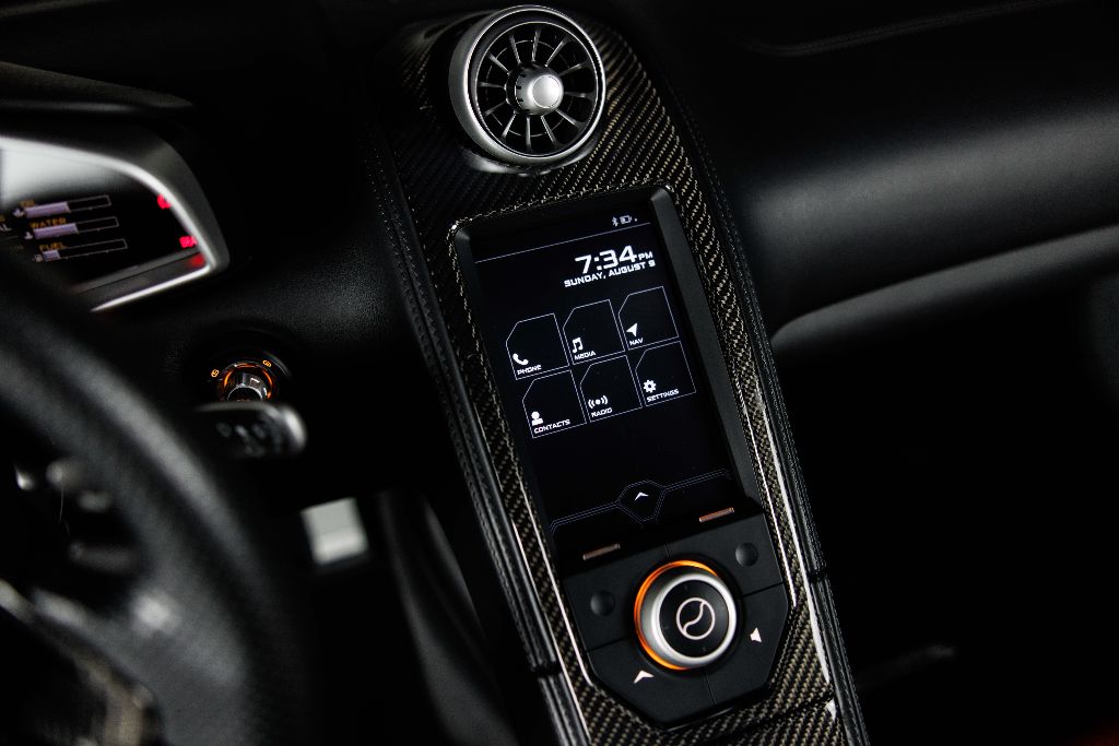 2012 McLaren MP4-12C - $145,990