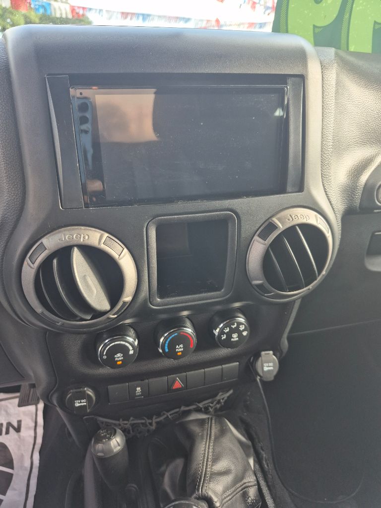2015 Jeep Wrangler - $15,999