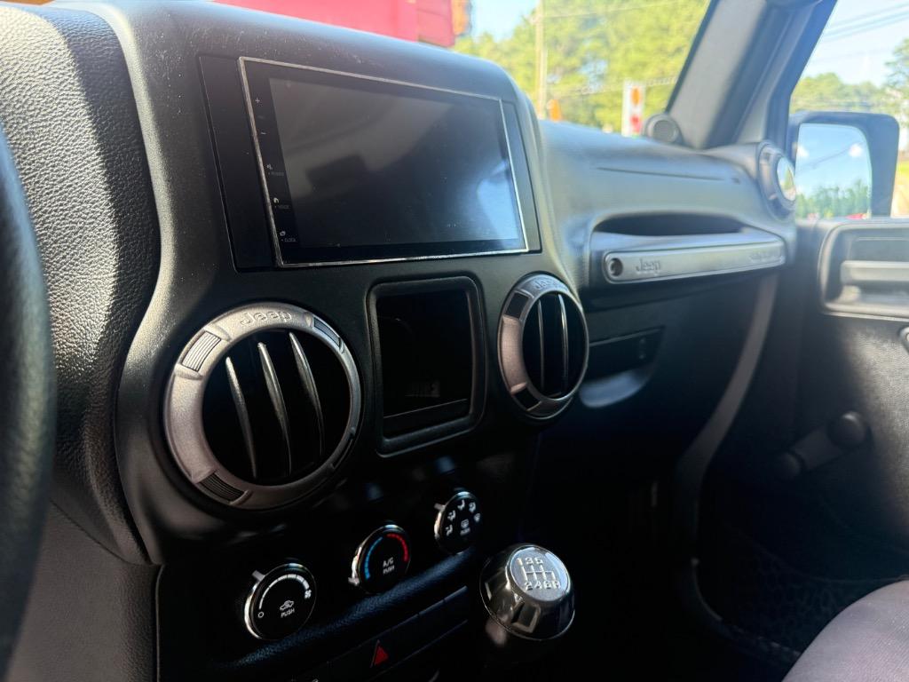 2014 Jeep Wrangler - $16,699