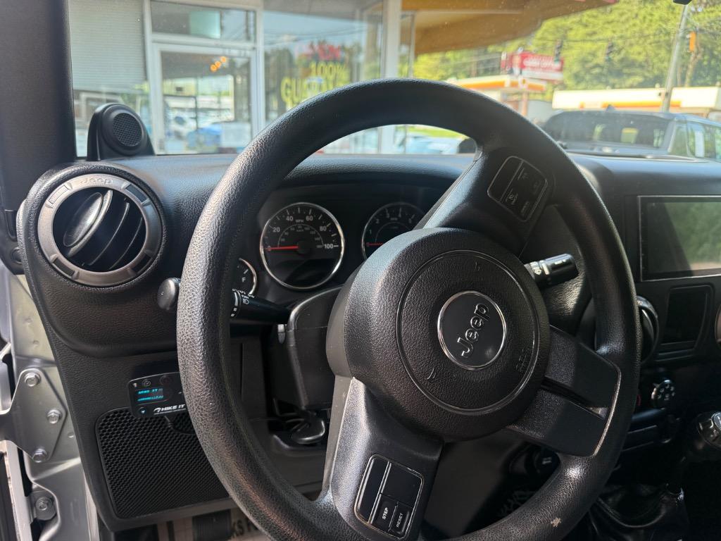 2014 Jeep Wrangler - $16,699