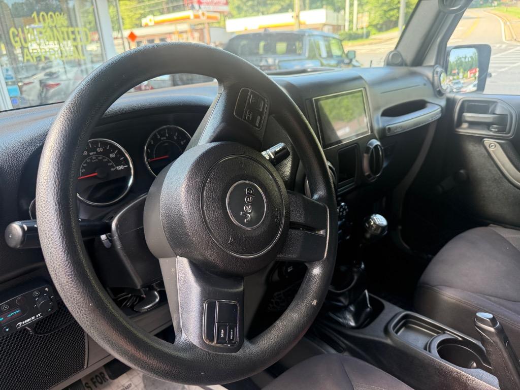 2014 Jeep Wrangler - $16,699