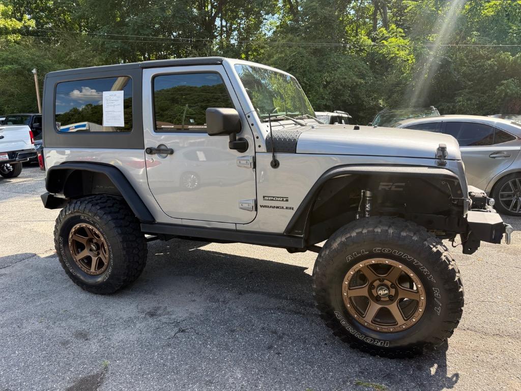 2014 Jeep Wrangler - $16,699