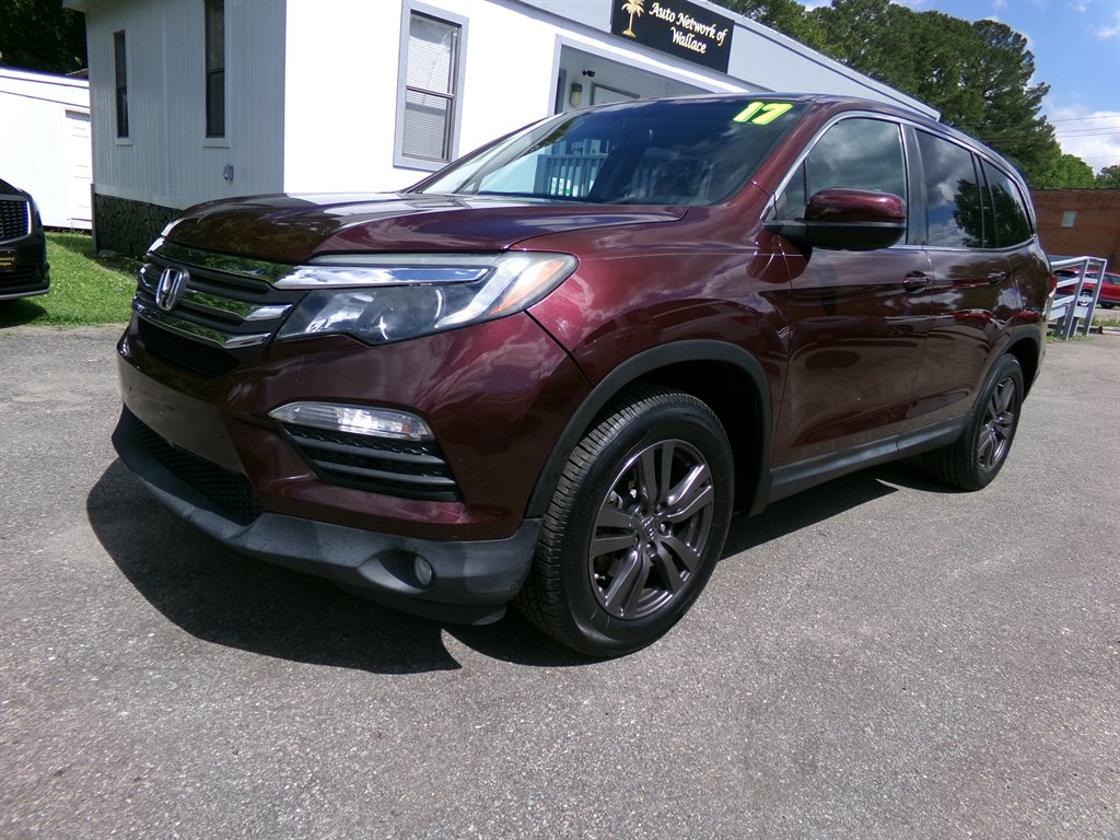View vehicle photo 3