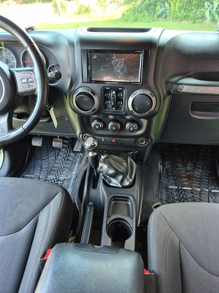 2016 Jeep Wrangler - $14,999