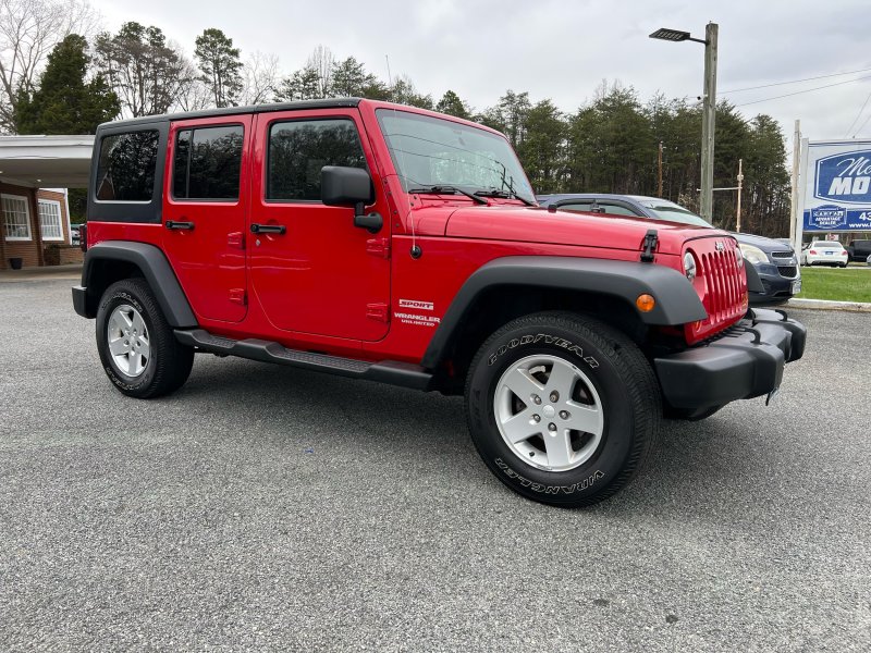 Red 2011 Jeep Wrangler Unlimited Sport 4WD SUV / Crossover Four-Wheel Drive 4-Speed Automatic