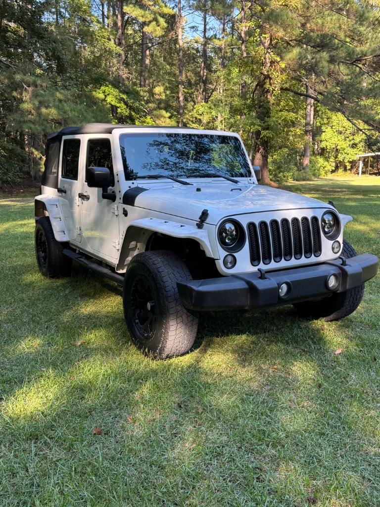2015 Jeep Wrangler - $14,000