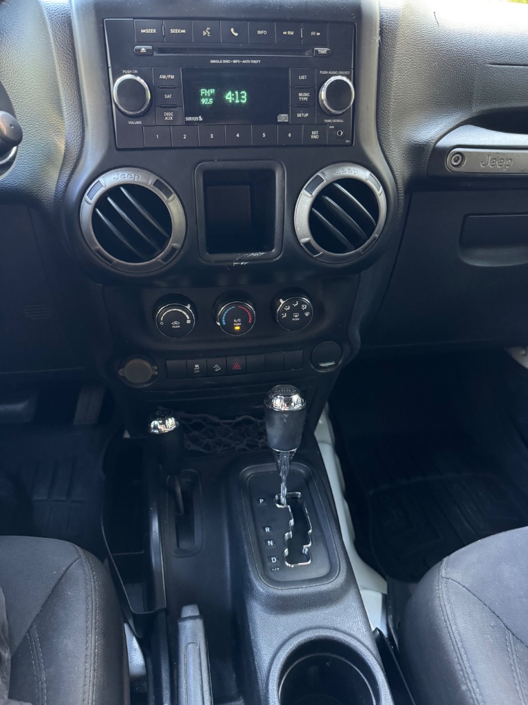 2015 Jeep Wrangler - $14,000