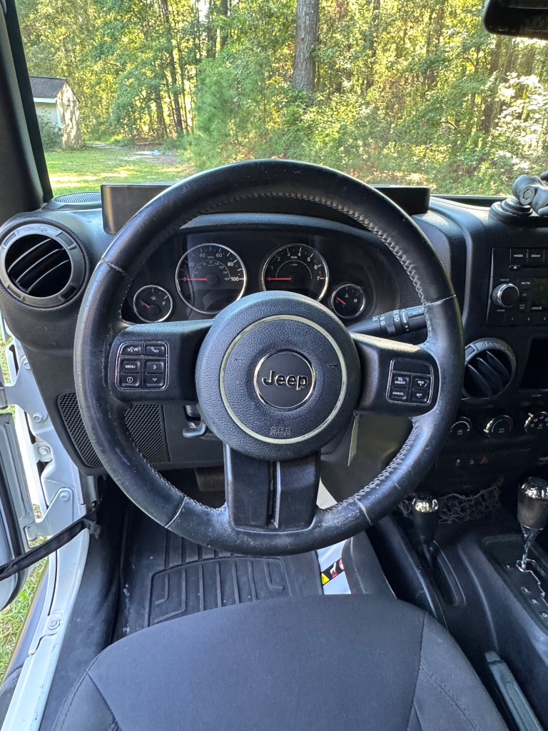 2015 Jeep Wrangler - $14,000