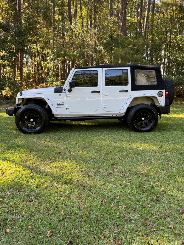 2015 Jeep Wrangler - $14,000