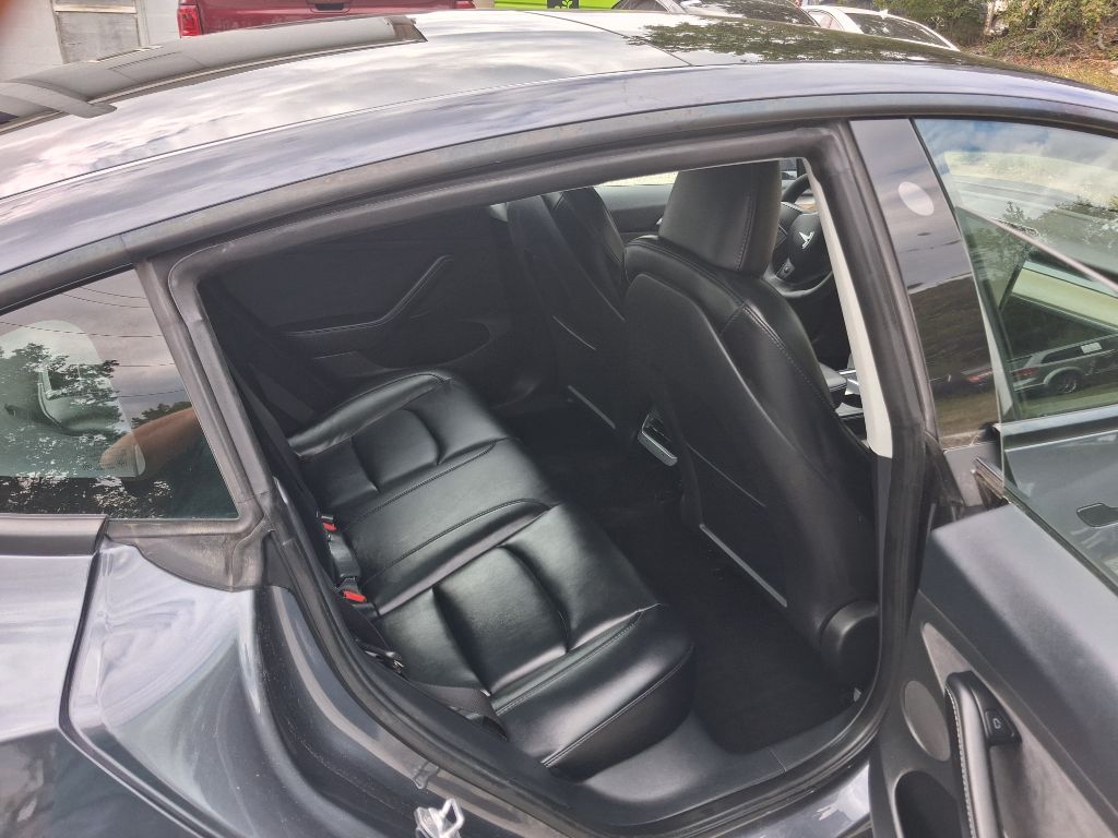 2023 Tesla Model 3 - $27,495