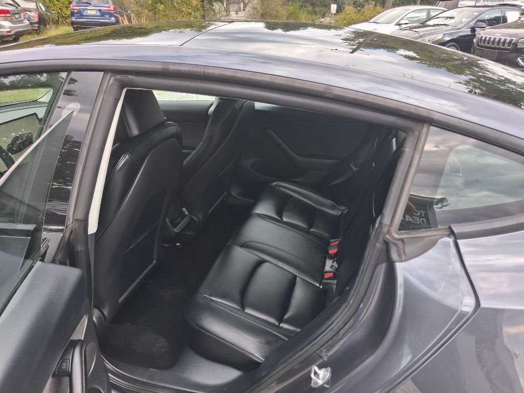 2023 Tesla Model 3 - $27,495