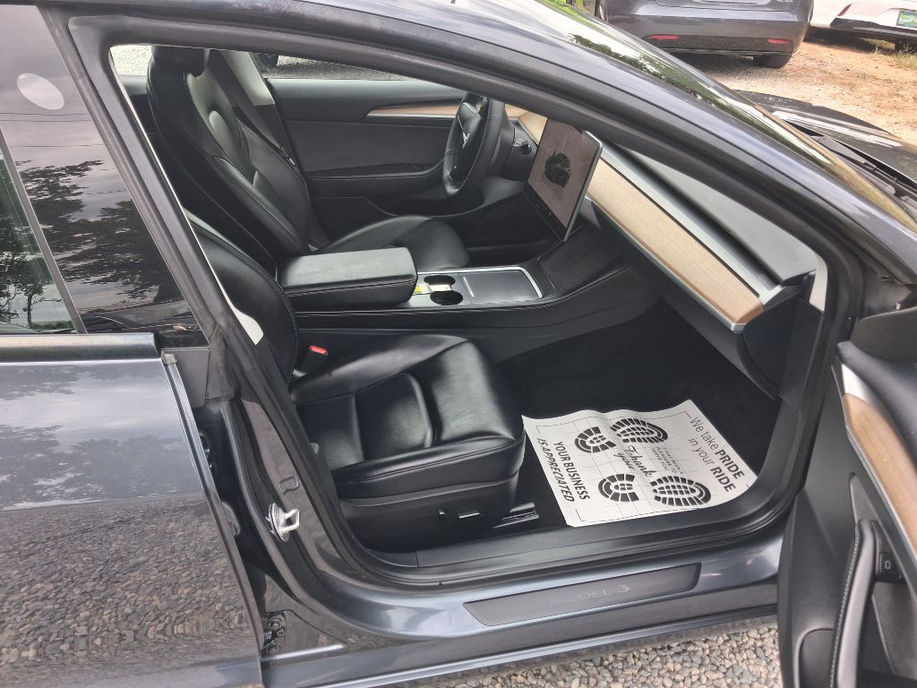 2023 Tesla Model 3 - $27,495