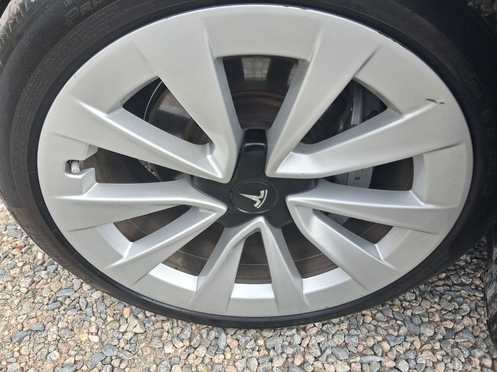 2023 Tesla Model 3 - $27,495