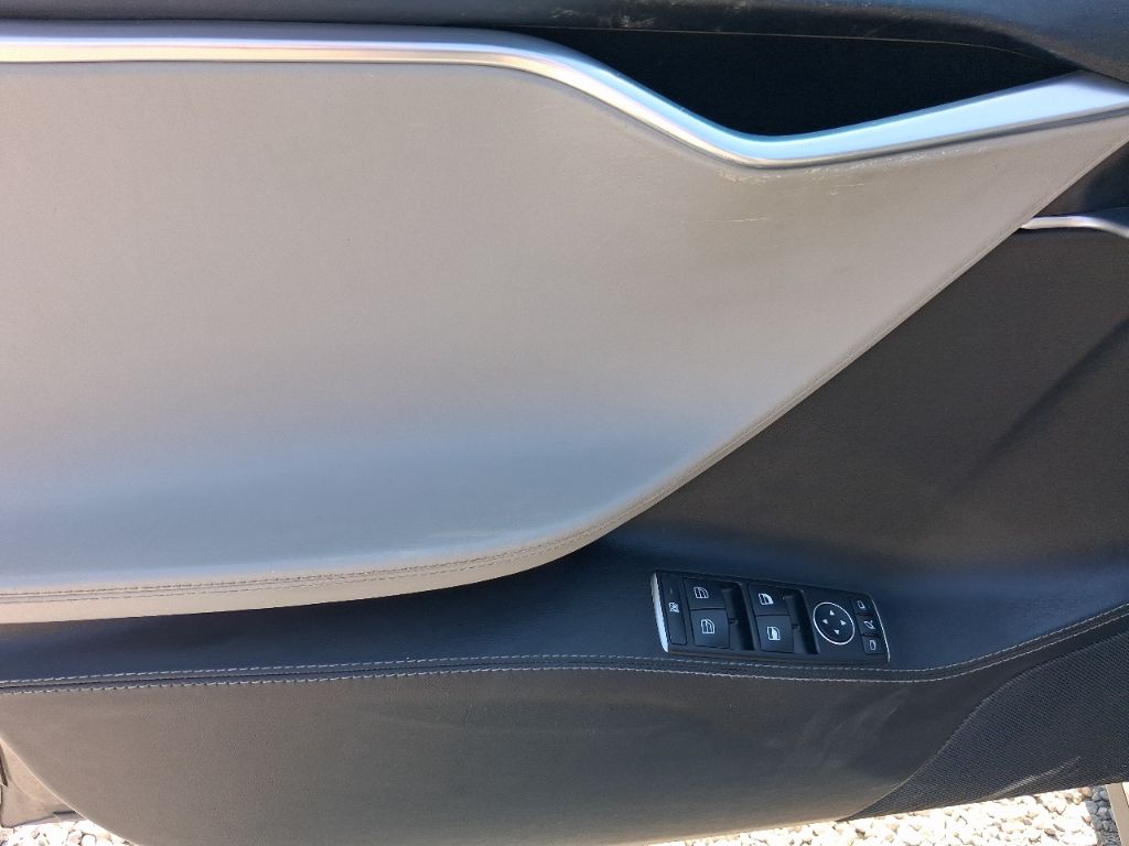2015 Tesla Model S - $11,398