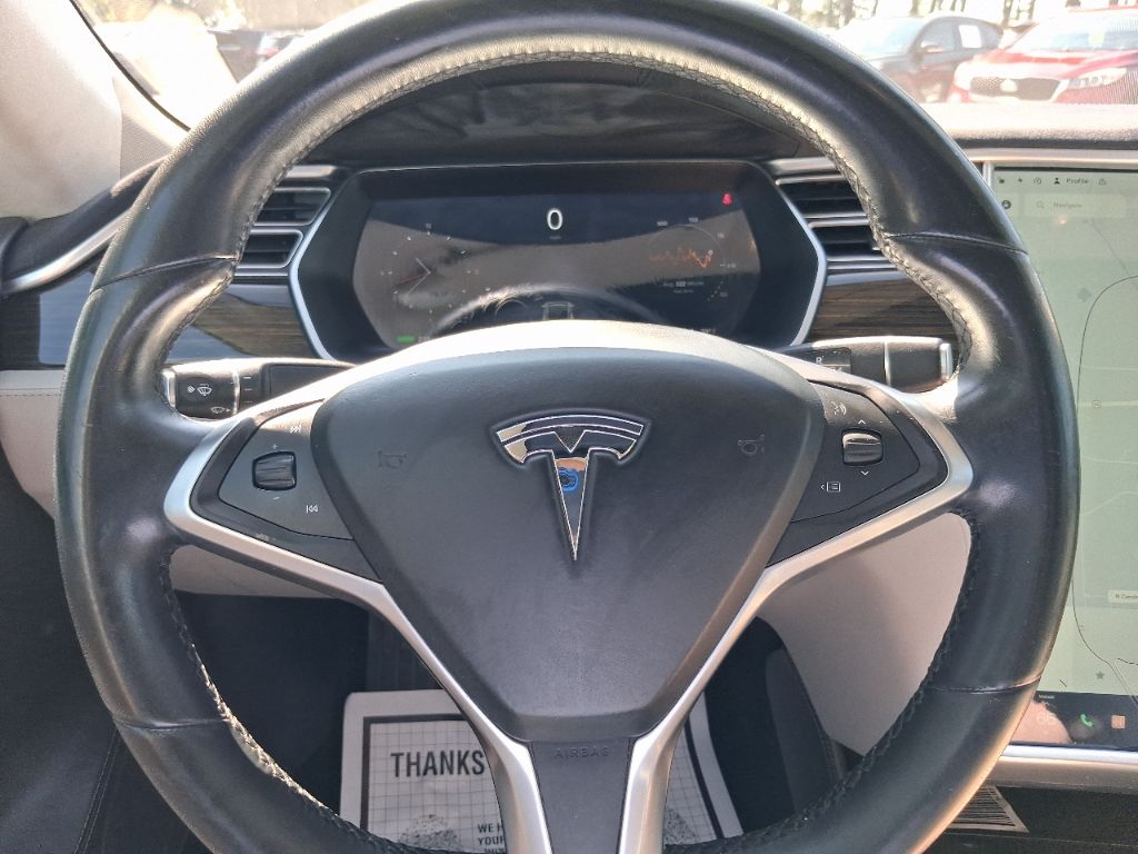 2015 Tesla Model S - $11,398