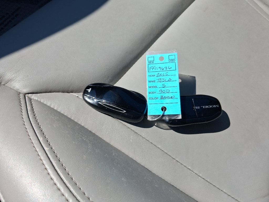 2015 Tesla Model S - $11,398