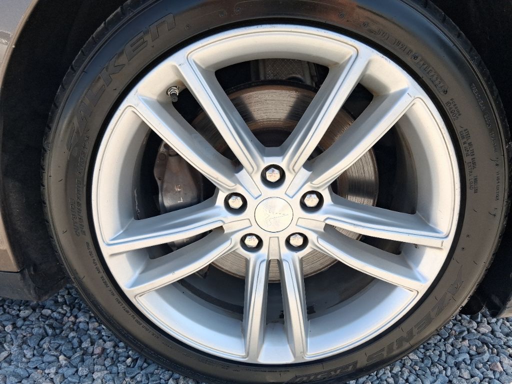 2015 Tesla Model S - $11,398