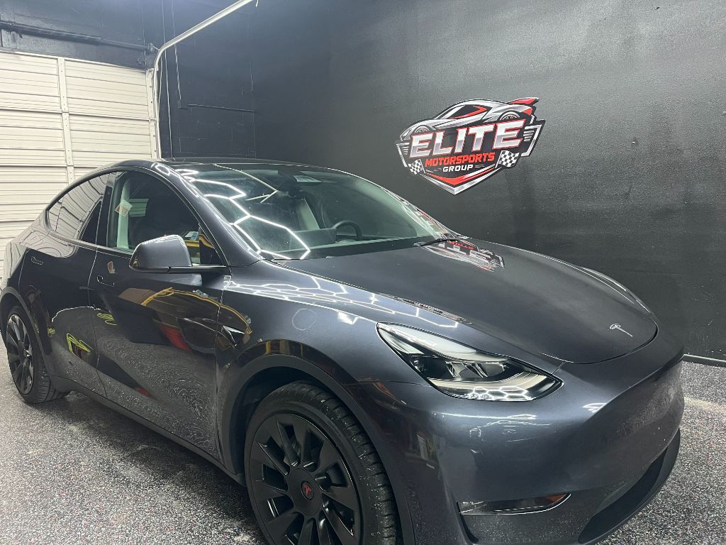 2024 Tesla Model Y - $32,000
